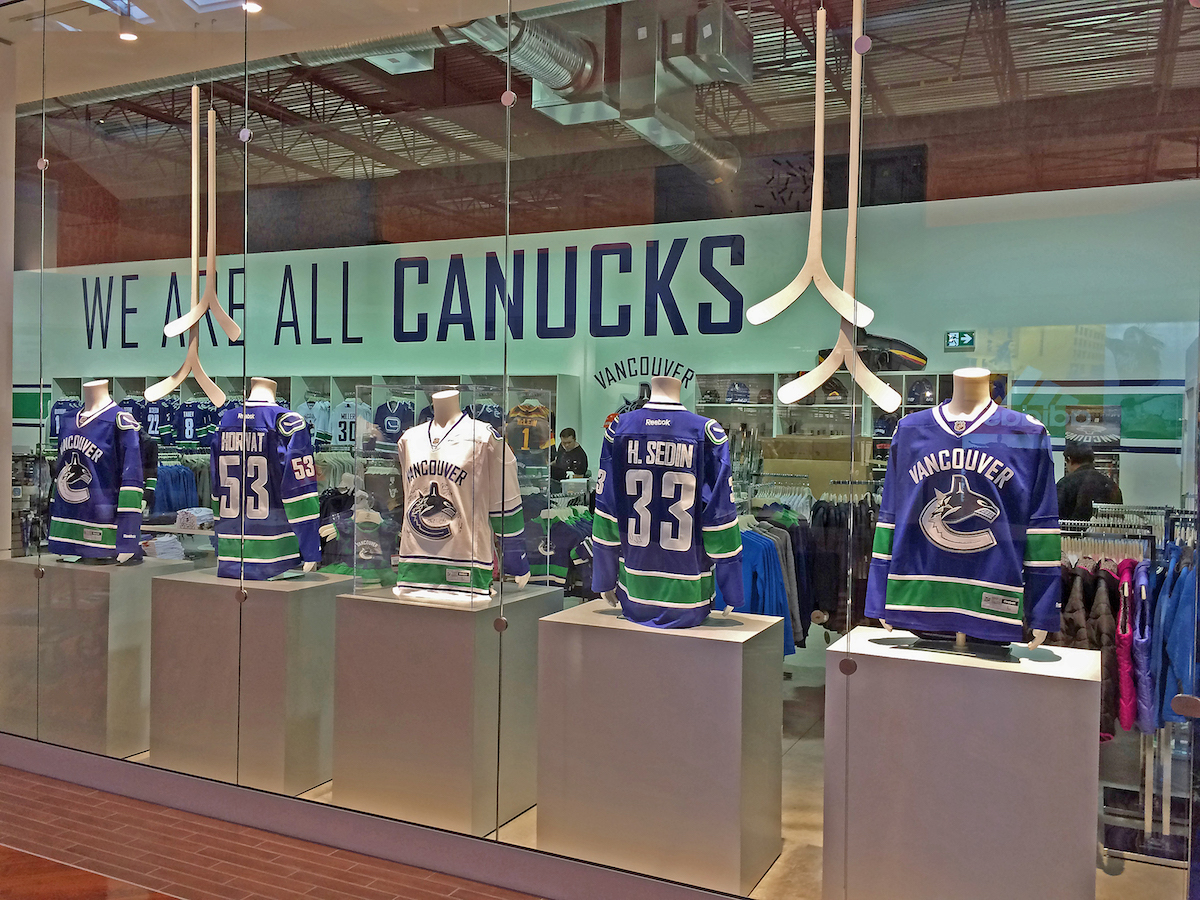 Vancouver Canucks' team store proudly displays Canucks-themed golf bag in  window
